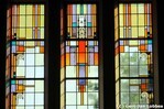 Het bovenste deel van één van de grote glas-in-loodramen op de verdieping.
<br/>
Gert-Jan Lobbes, 2017